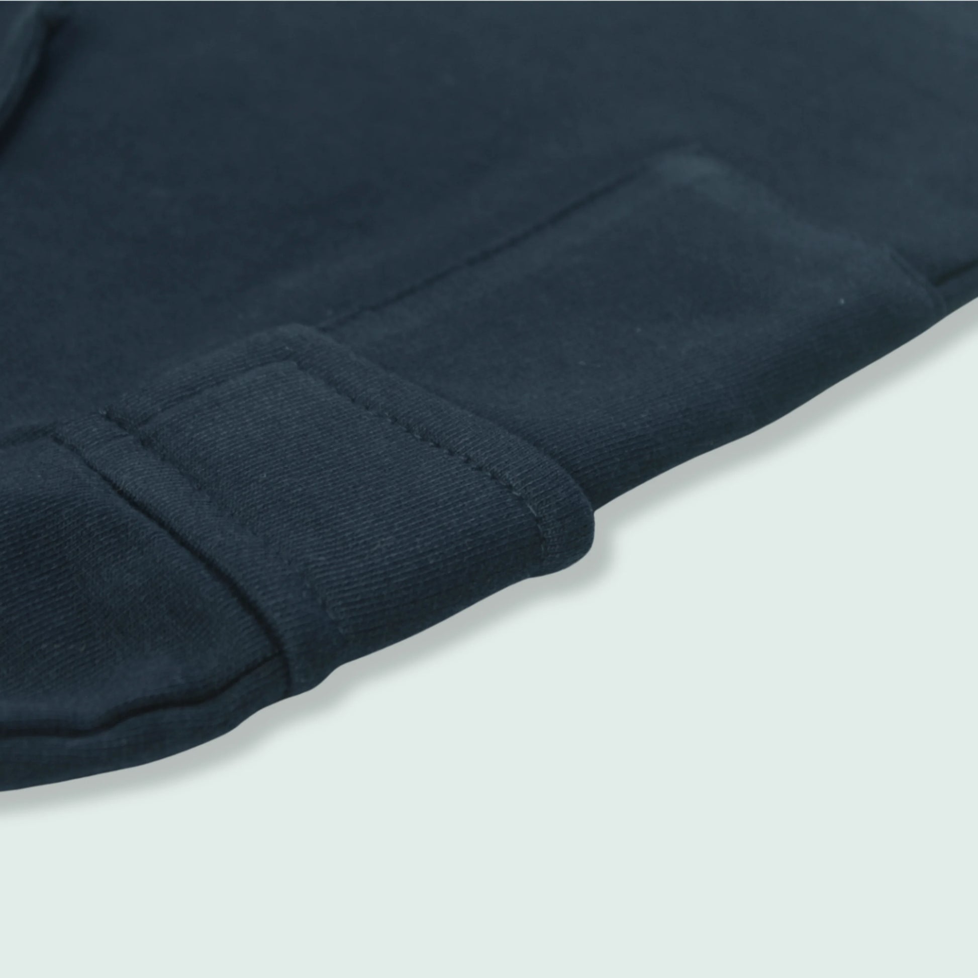 Side view of navy cotton shorts from baby boys clothing set – soft fabric and relaxed fit for active toddlers