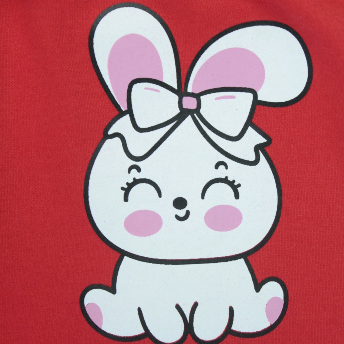 Close-up of rabbit print and fabric texture on red cotton joggers – premium quality baby clothes for girls