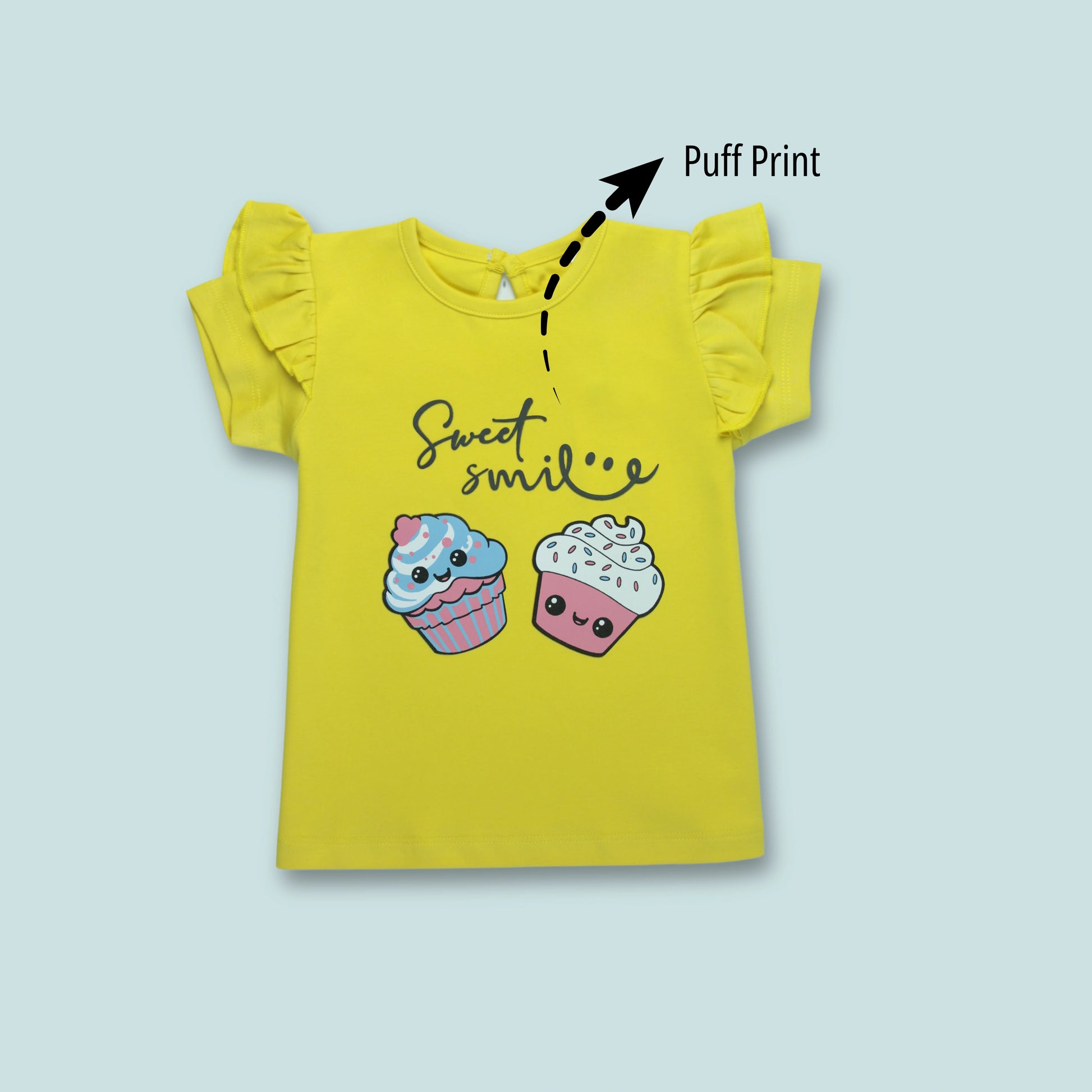 Front view of yellow cotton half sleeve T-shirt with playful cupcake print – adorable and comfy baby clothes for girls.