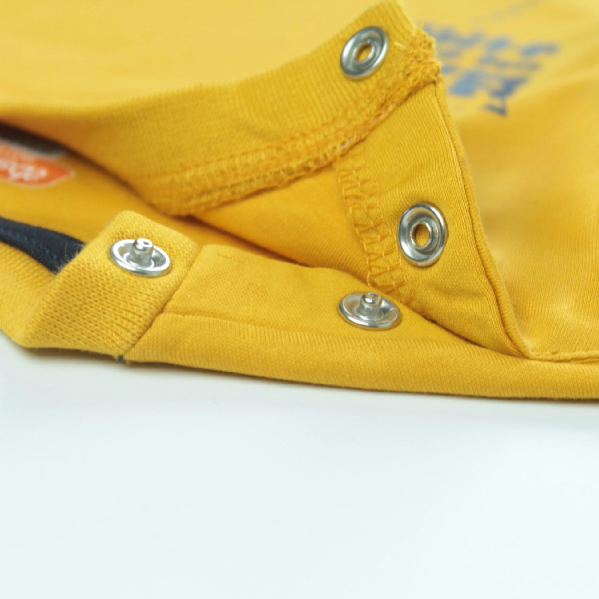 Infant boy wearing golden astronaut print T-shirt – stylish and comfortable clothing for infant by Littleseeds™.