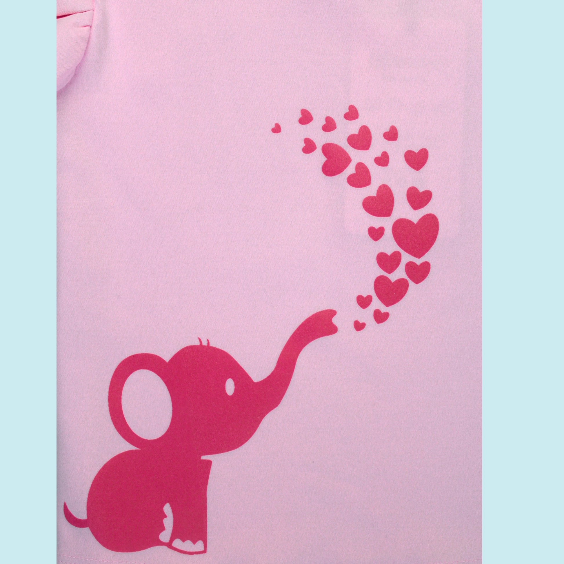 Close-up of the adorable elephant print and premium cotton fabric detailing on a pink frill sleeve T-shirt — trendy girlish outfit.