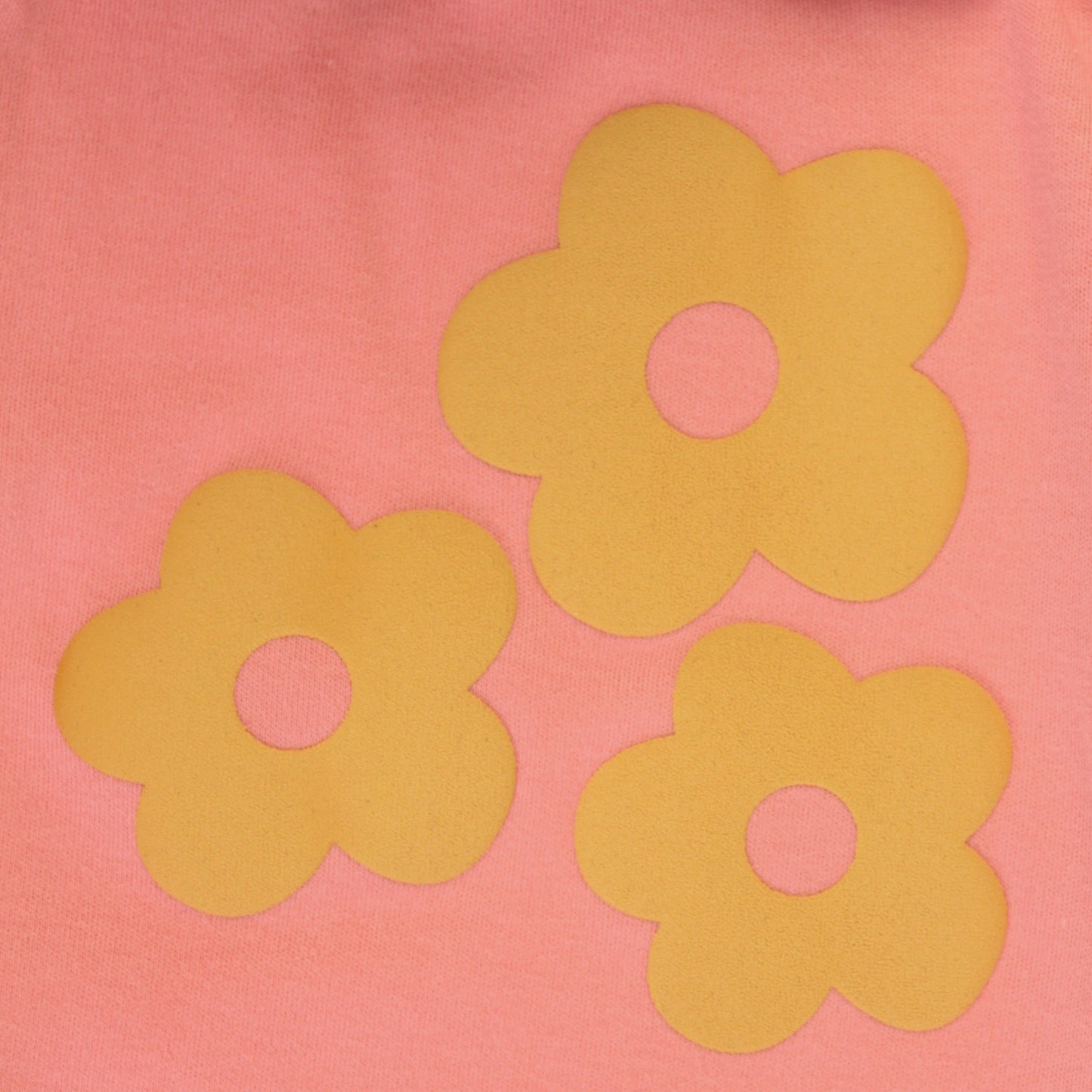 Fabric close-up of coral red cotton jogger pant – soft, durable, and comfortable night dress for childrens.