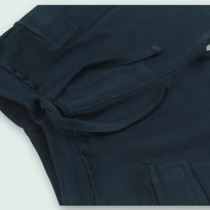 Close-up of elastic waistband on navy cotton shorts – comfortable and secure fit baby clothes for boys from Littleseeds™