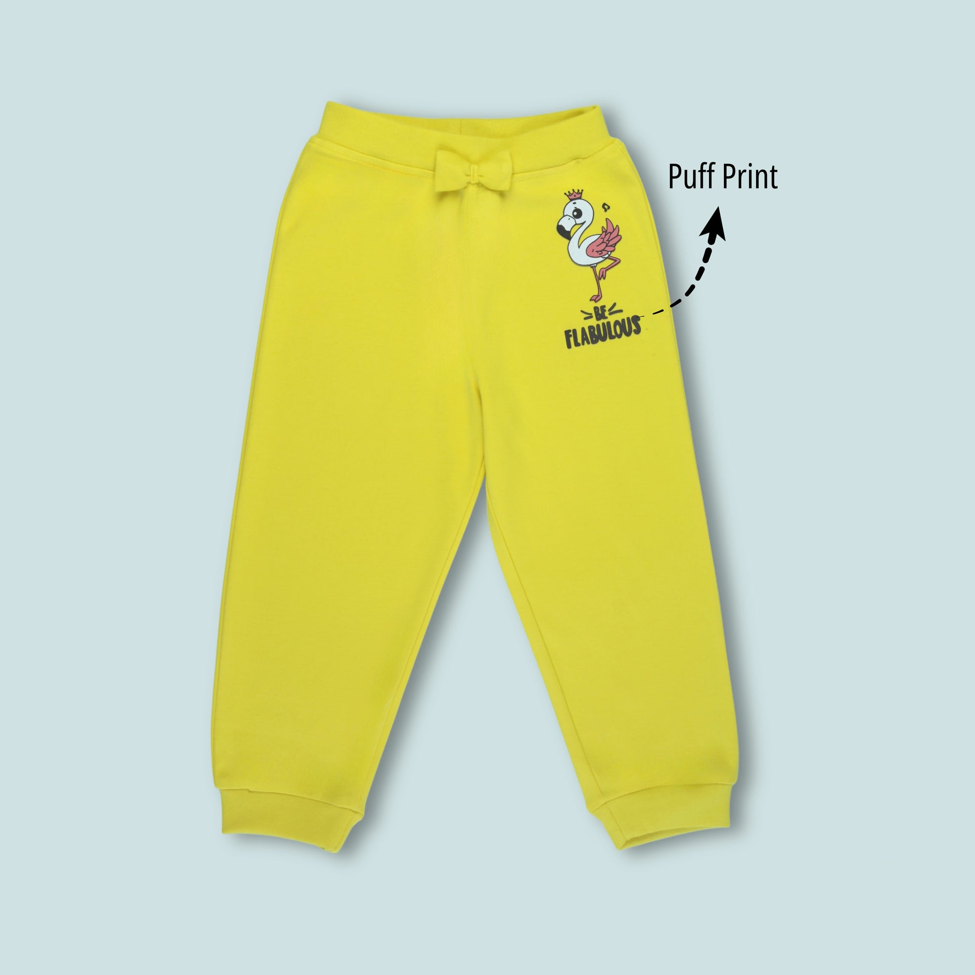 Front view of girls cotton joggers with cute flamingo print in yellow – stylish girlish outfits from Littleseeds™ Kidswear.