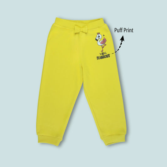 Front view of girls cotton joggers with cute flamingo print in yellow – stylish girlish outfits from Littleseeds™ Kidswear.