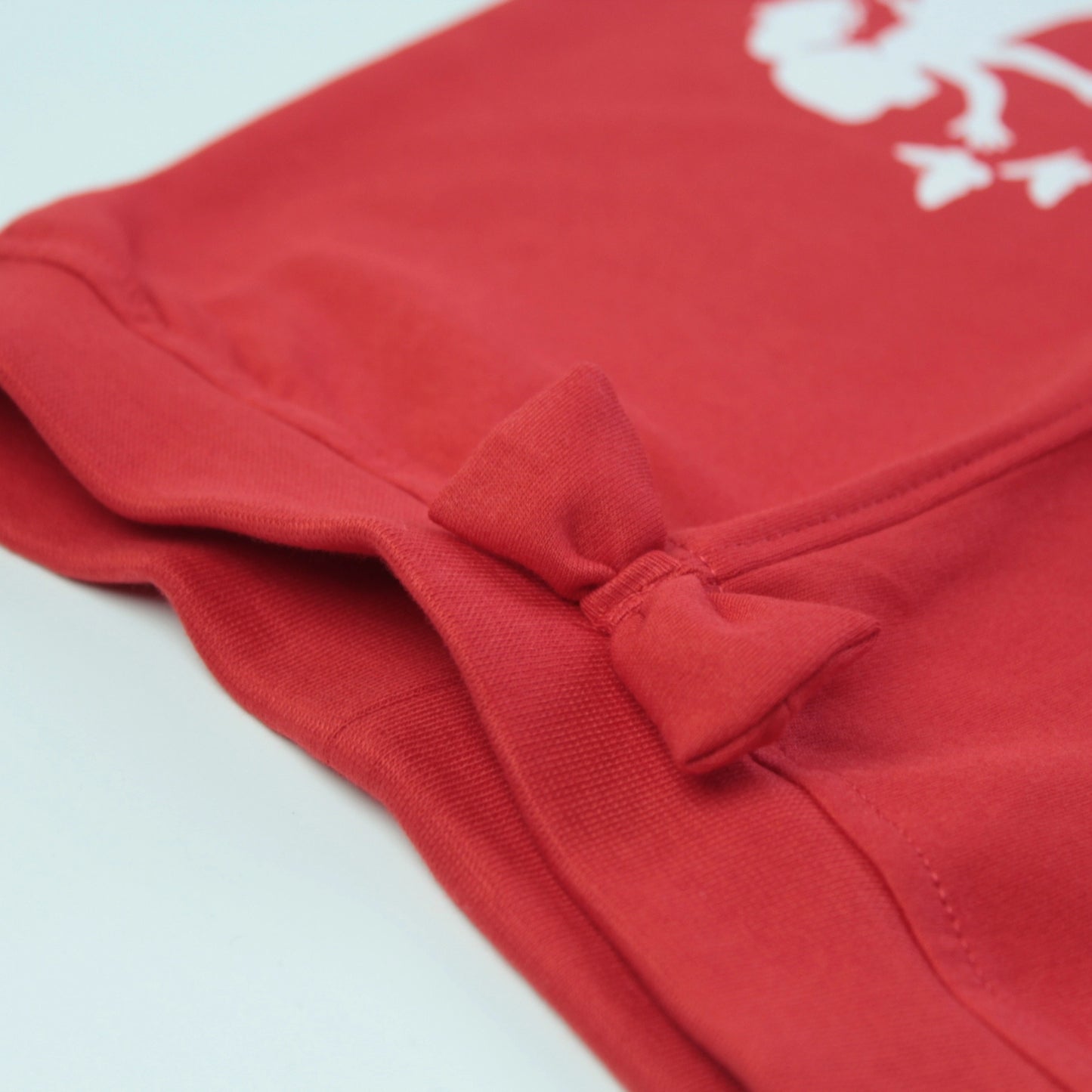 Detailed view of fabric and stitching on red cotton joggers – premium quality girlish outfits from Littleseeds Kidswear