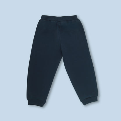 Back view of girls joggers featuring soft cotton fabric and butterfly design in navy – stylish and comfy choice for kids.