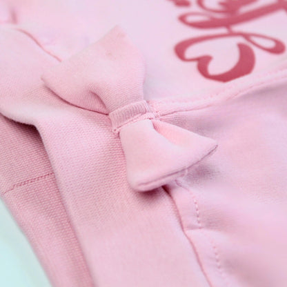 Detailed view of stitching and soft cotton fabric on pink girls joggers – durable and comfortable design