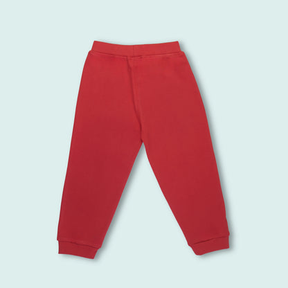 Back view of red cotton girls joggers featuring rabbit print — stylish and comfy kidswear perfect for daily wear and playtime.