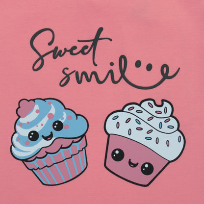 Close-up of cupcake placement print on pink cotton T-shirt – premium quality ladki dress with playful design.