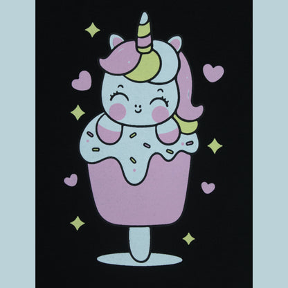 Close-up view of unicorn print on black puff sleeve T-shirt – playful and cute detail from latest girlish dresses collection.