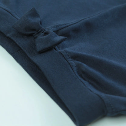 Detailed view of elastic waistband and seam finishing on navy cotton jogger pant – high-quality childrens night dress.